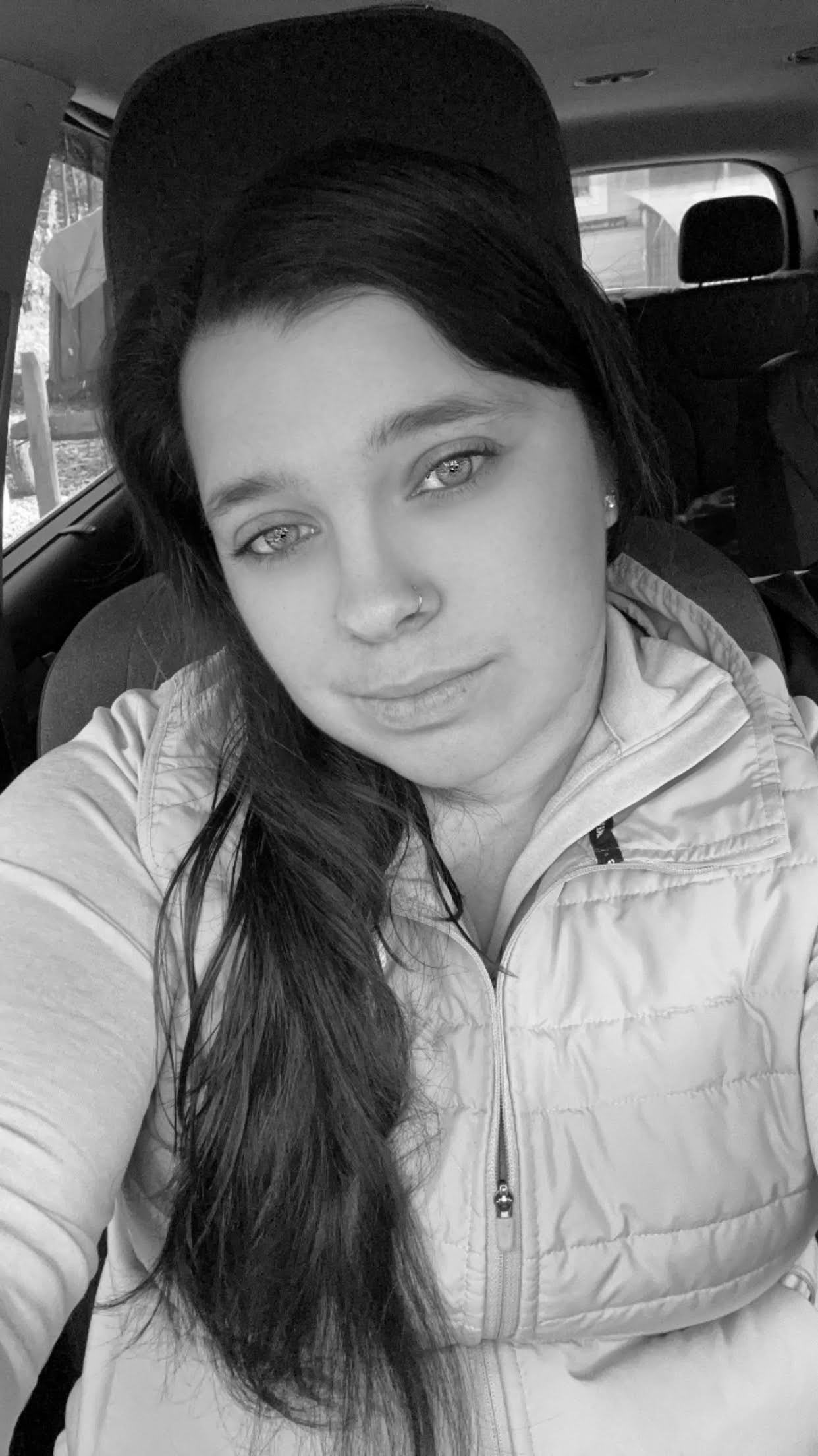 black and white selfie in a car
