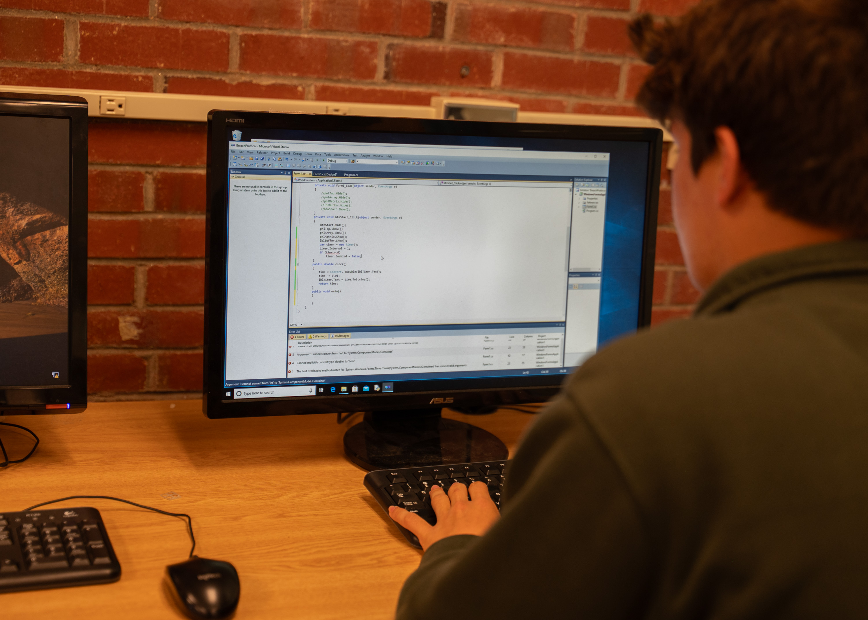 Student working on code in computer science