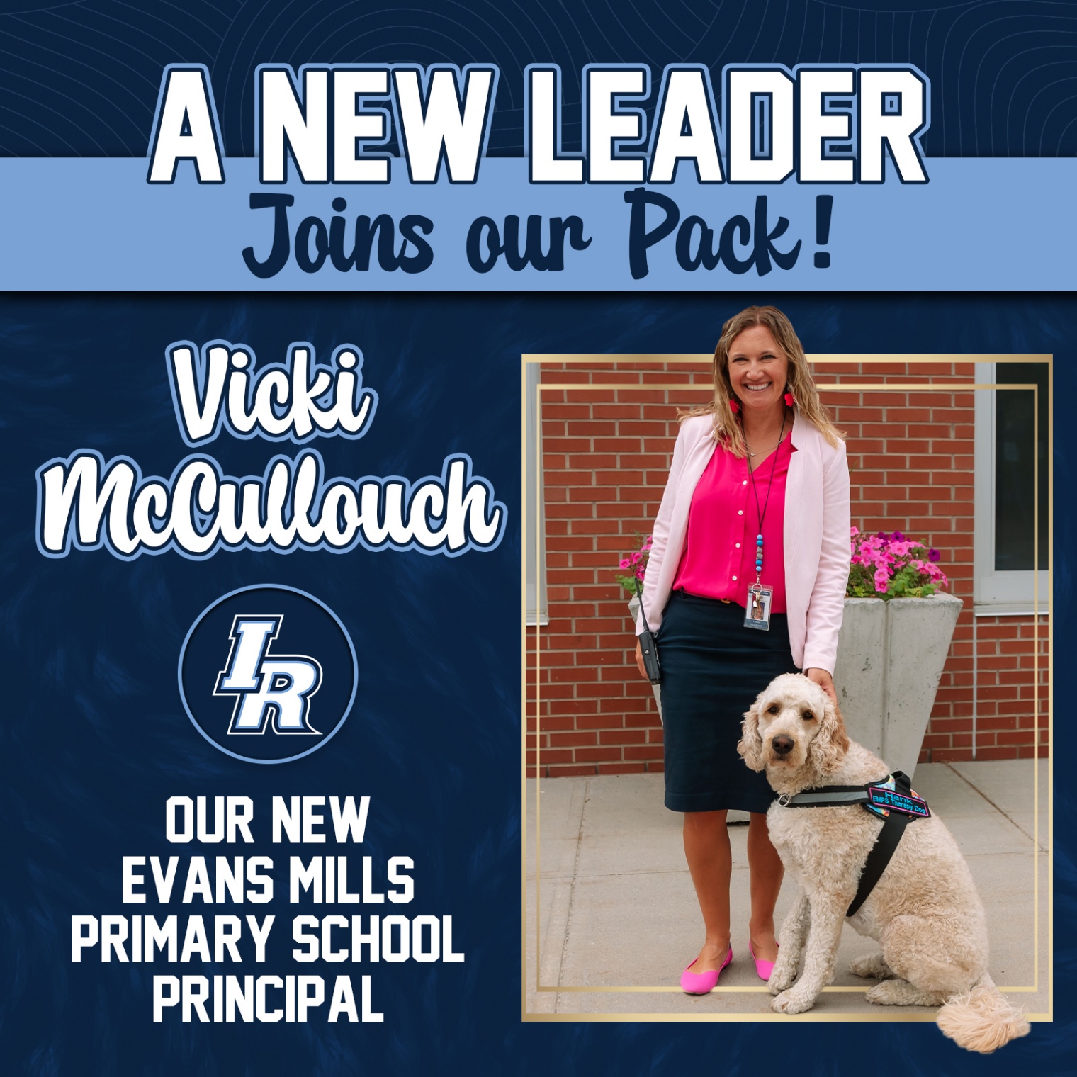 New EMPS Principal, Vicki McCullouch, stands with the school’s therapy dog, Hank.