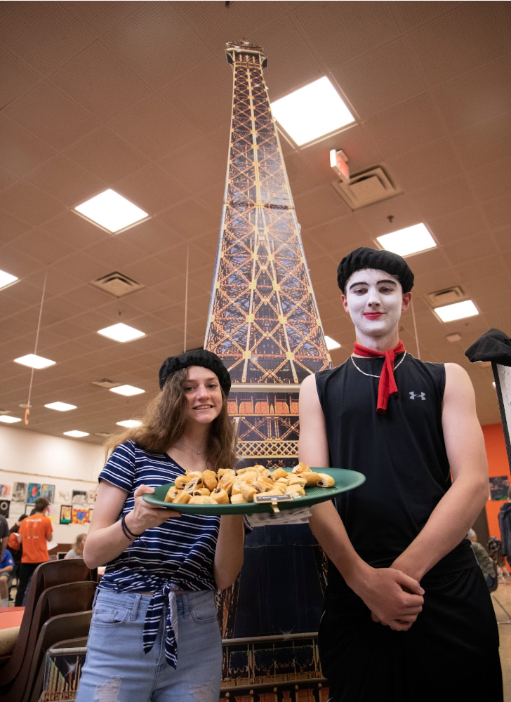 mime, student and eiffel tower