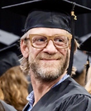 Man in graduation cap 
