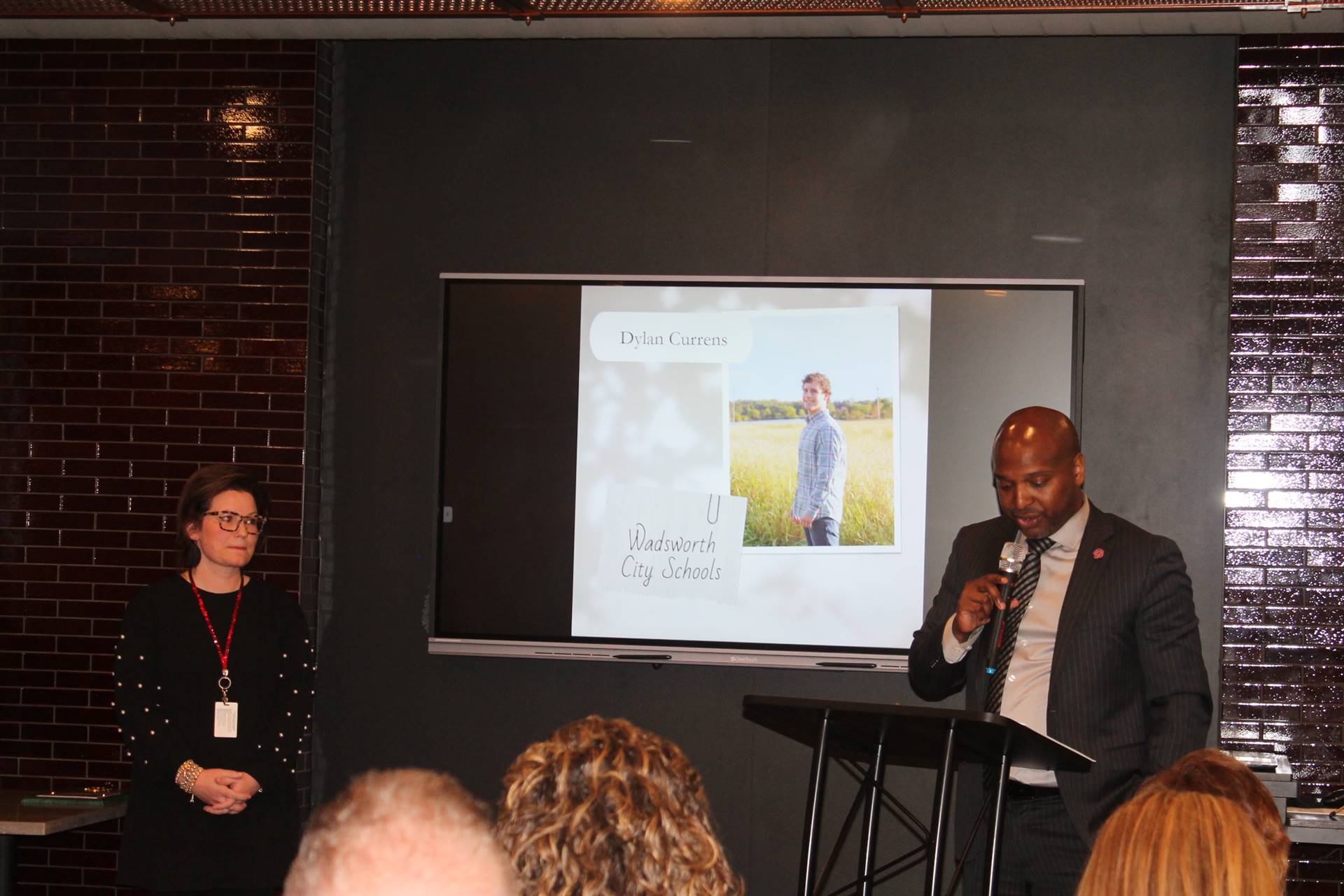 Wadsworth HS Principal Vincent Suber accepts awards on behalf of Dylan Currens and Kayln Davis