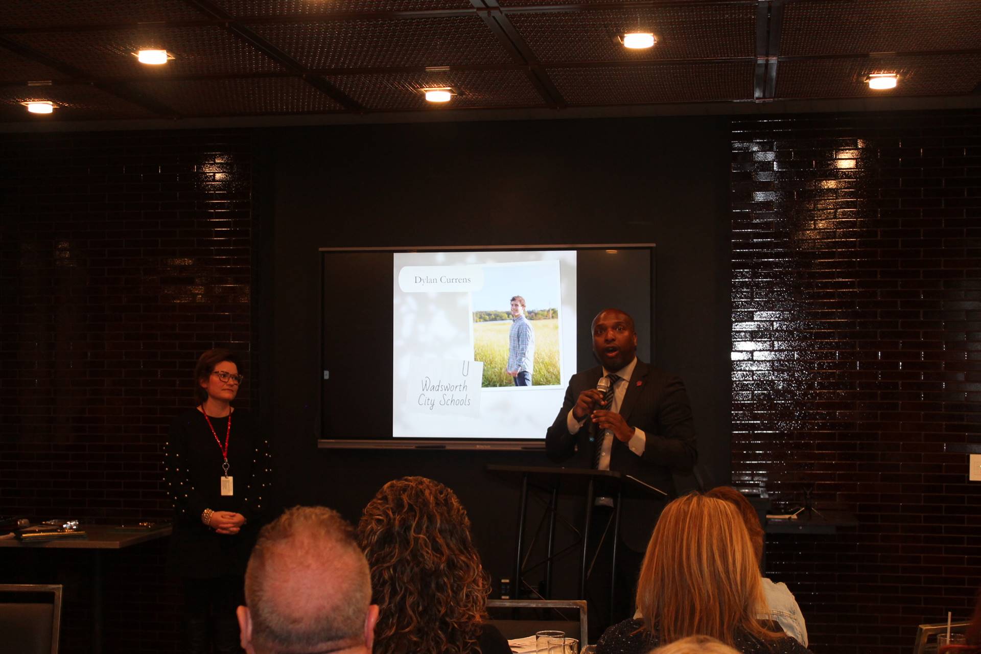 Wadsworth HS Principal Vincent Suber accepts awards on behalf of Dylan Currens and Kayln Davis