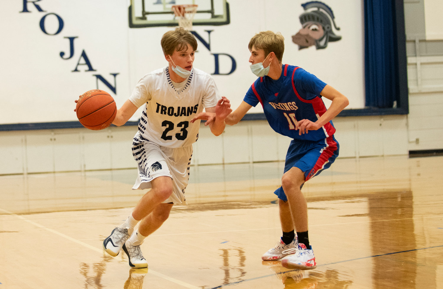 Middle Schoolers playing basketball