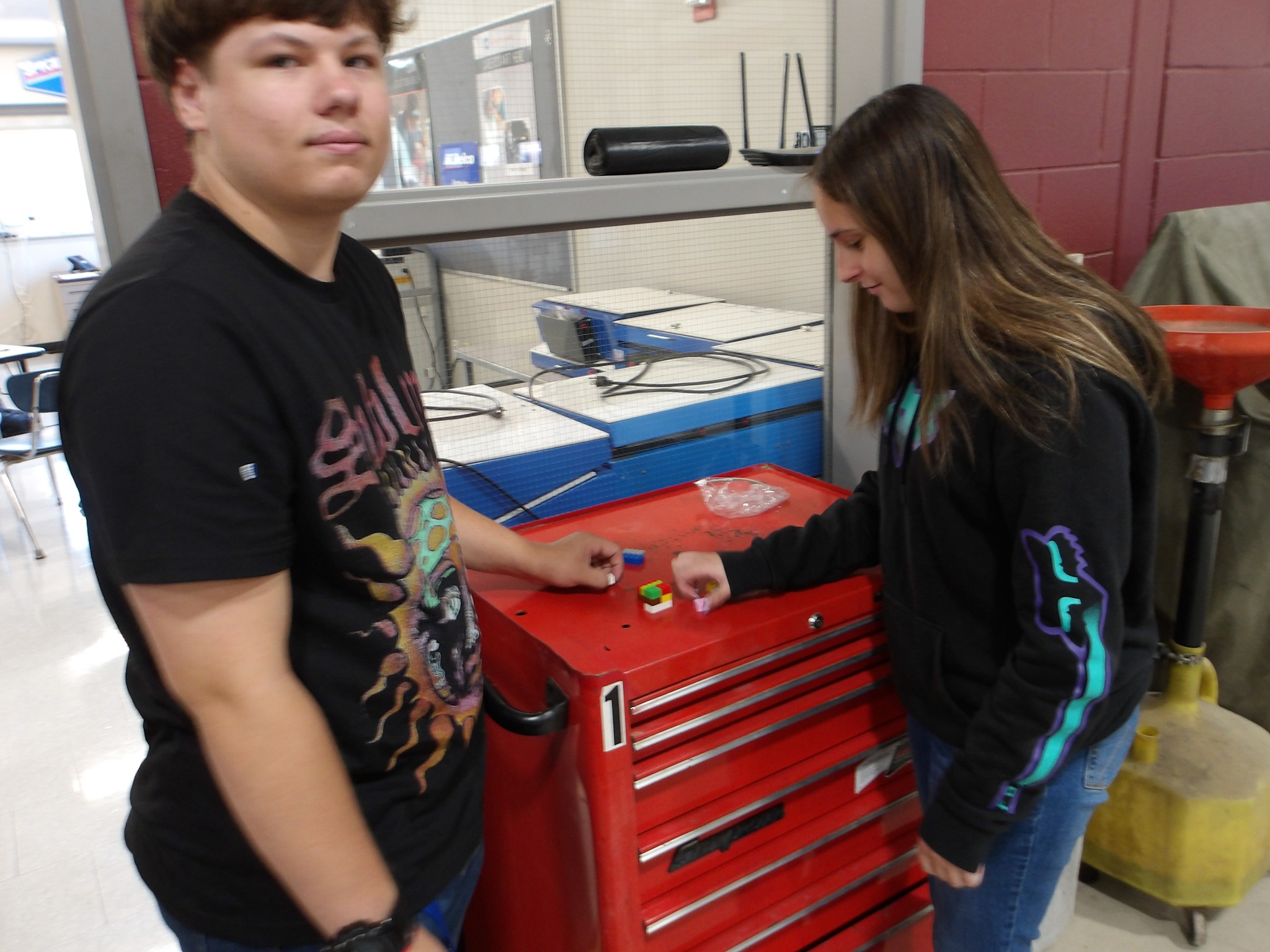 Student working in the auto shop
