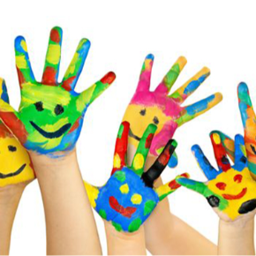 Children's hands painted with faces on the palms