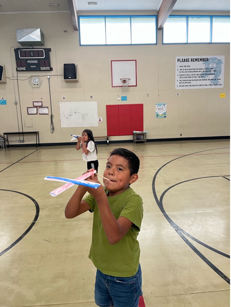 Kid with Paper Airplane