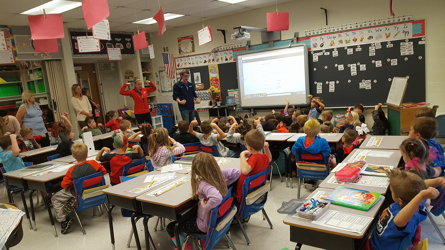 classroom with kids and teacher