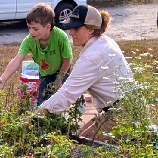 Student works in the garden