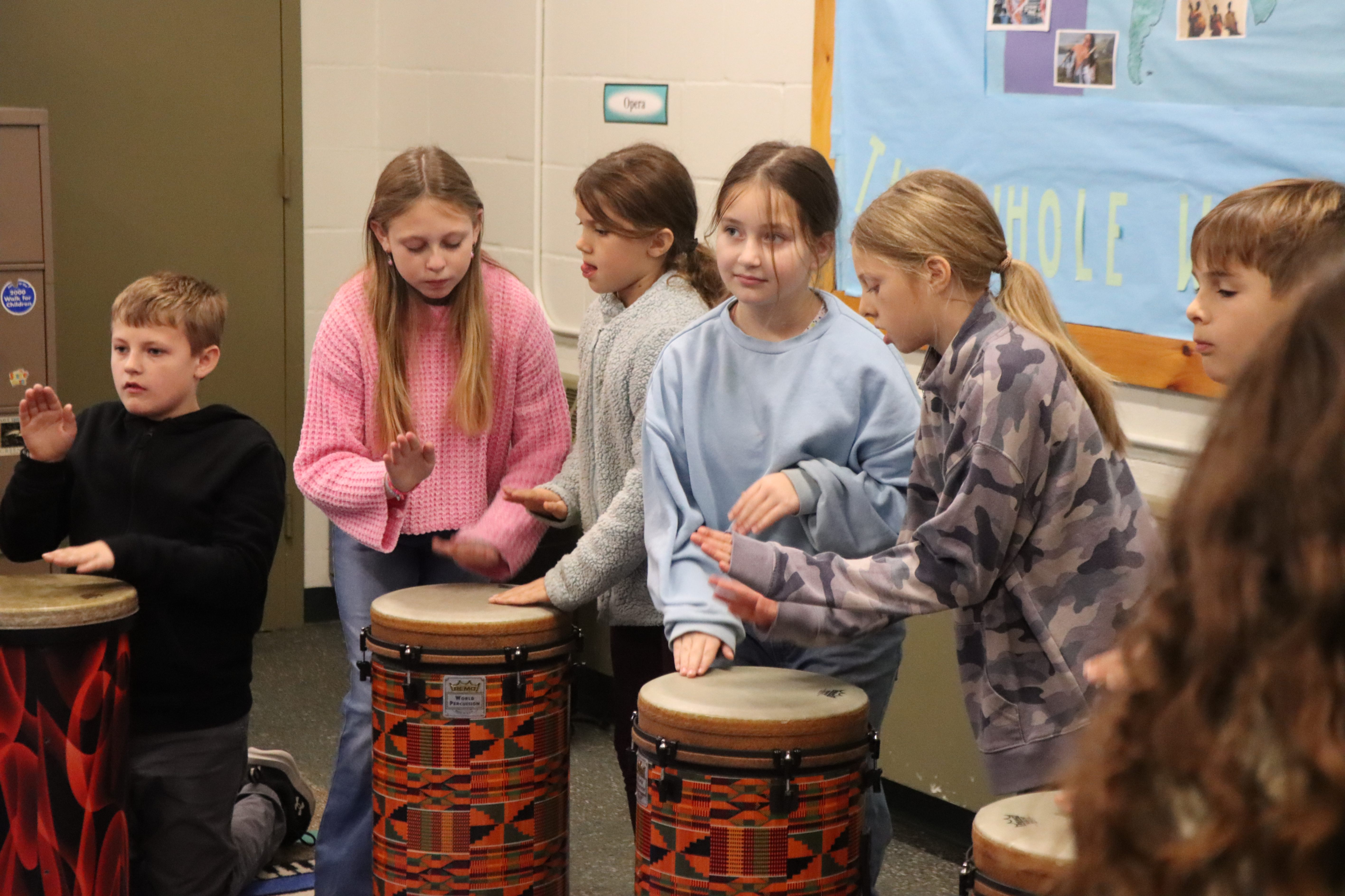 students playing drums