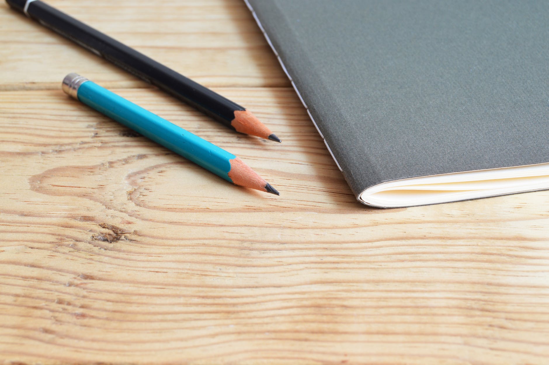 image of pencils and notebook