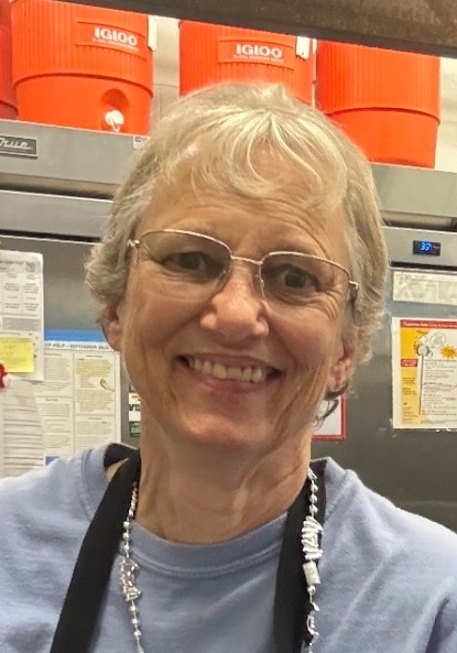 smiling lady with white hair