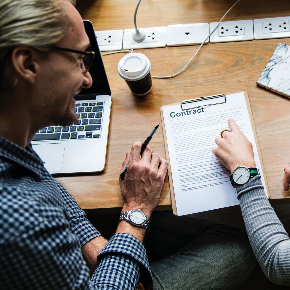 two people looking at a form