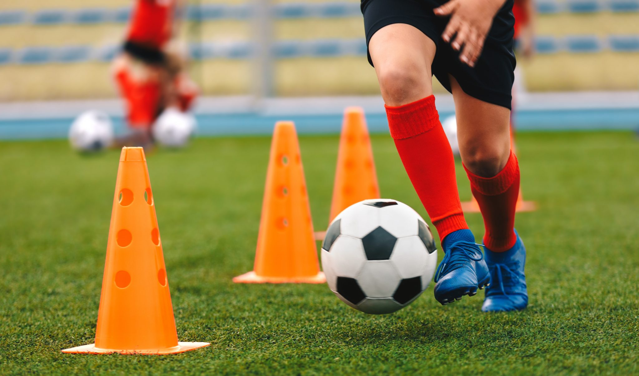 child playing soccer