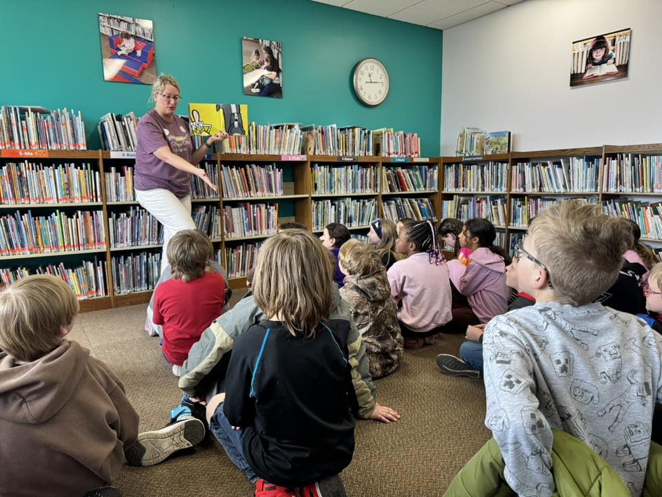 students listen to a book being read
