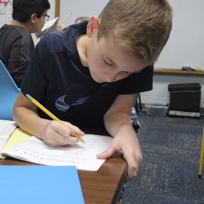 student working on assignment