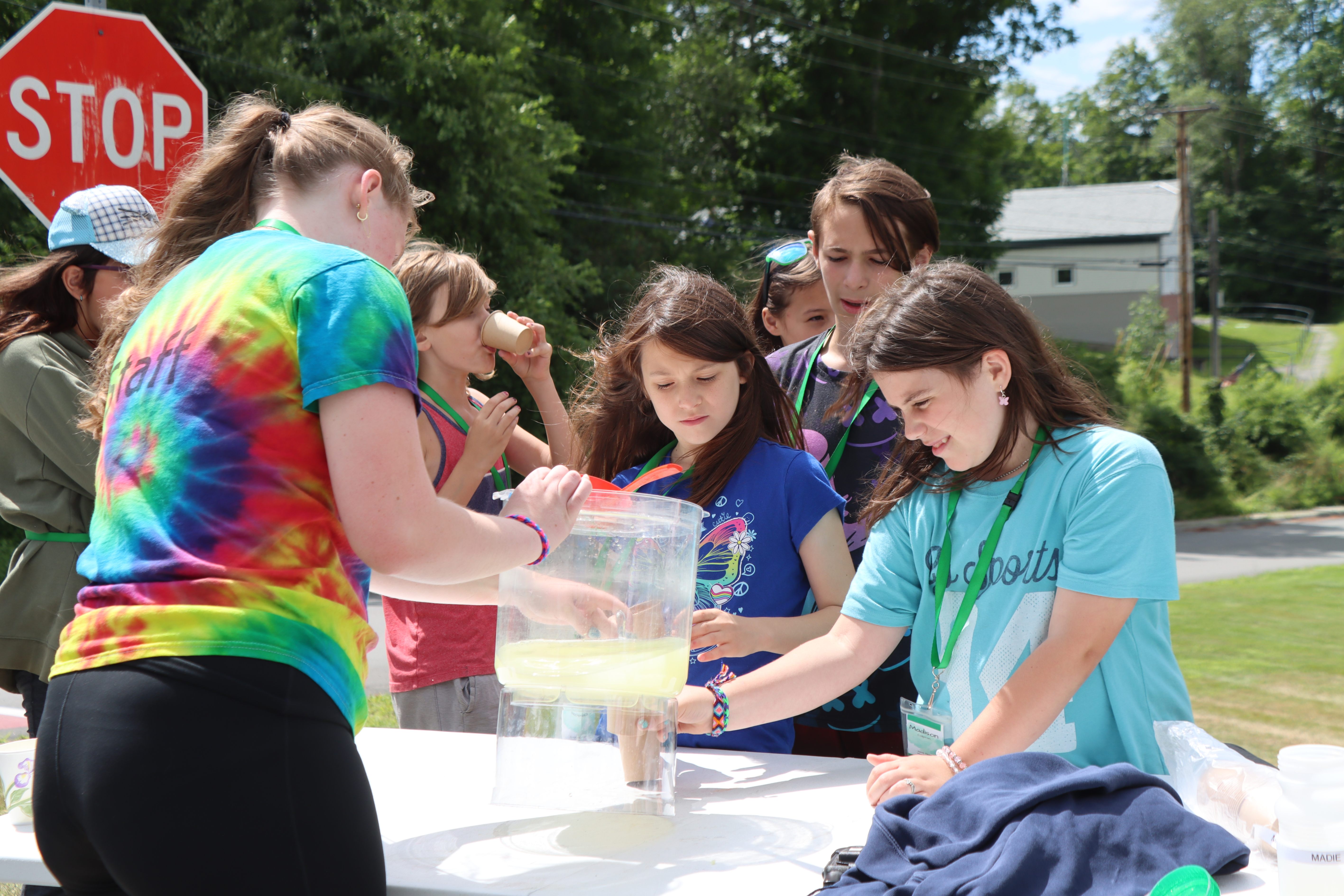 campers running a lemonade stand