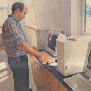 Bob Jaques works on a computer.