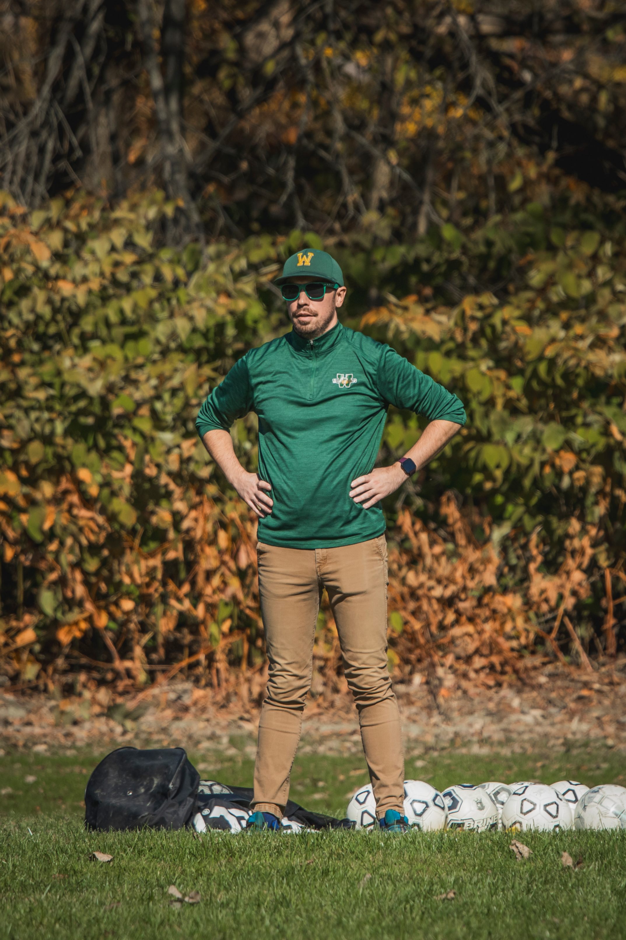 coach in green 