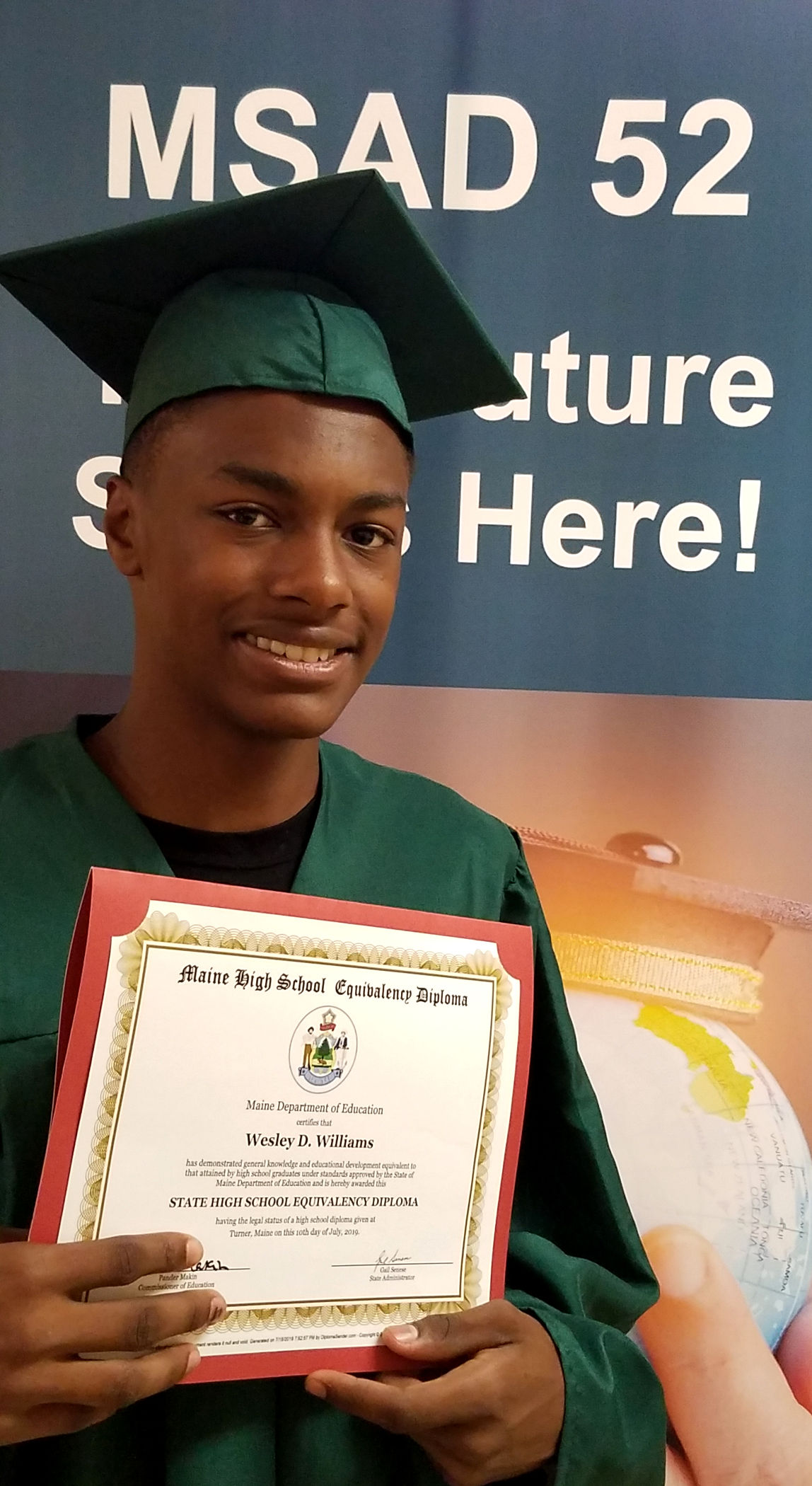 Adult Ed student with his diploma