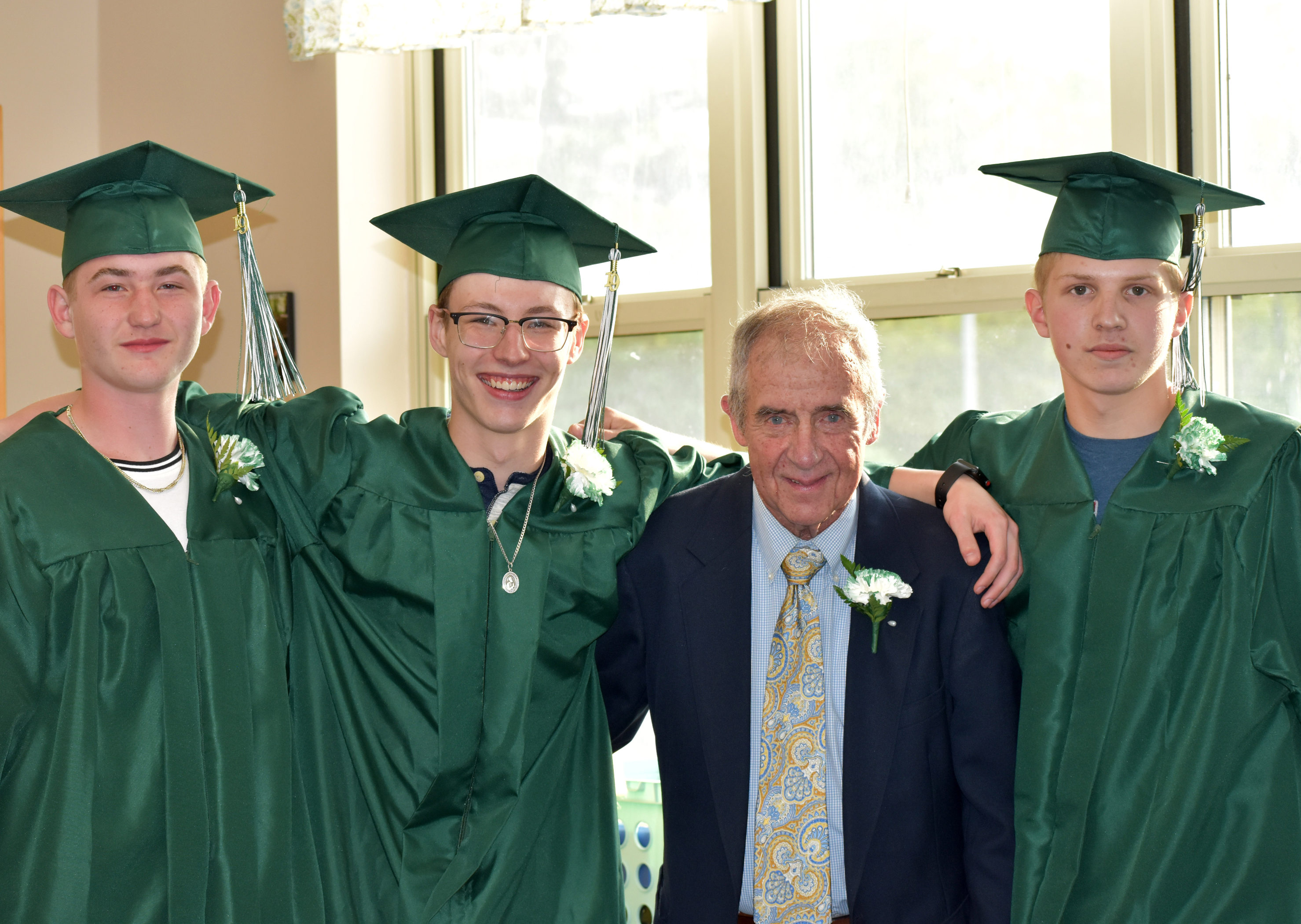 Adult Ed instructor Larry Sirois with graduating students
