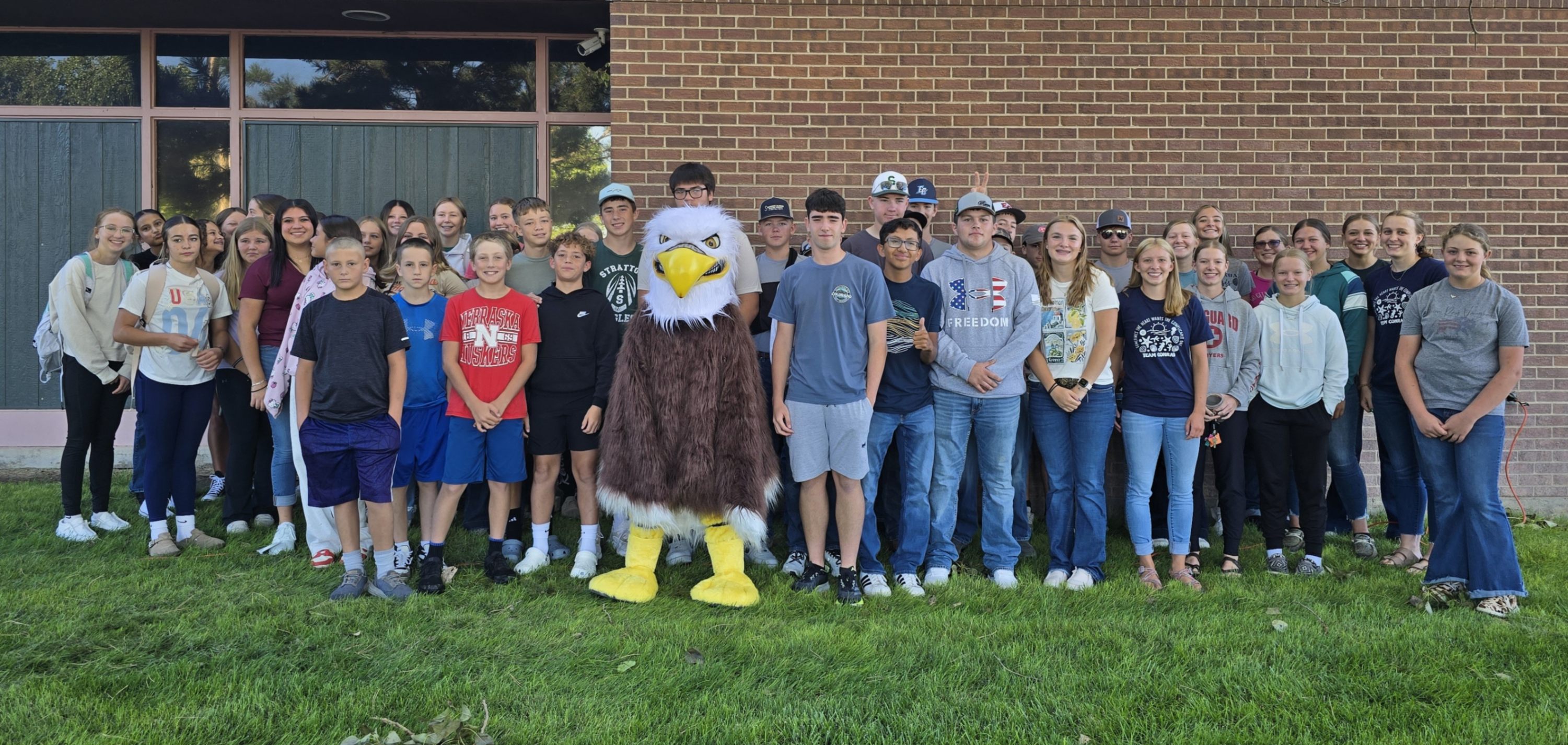 Middle/High School students welcoming the elementary to their first day of school 2025