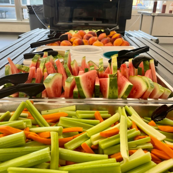 Vegetables and fruit in a school lunch line