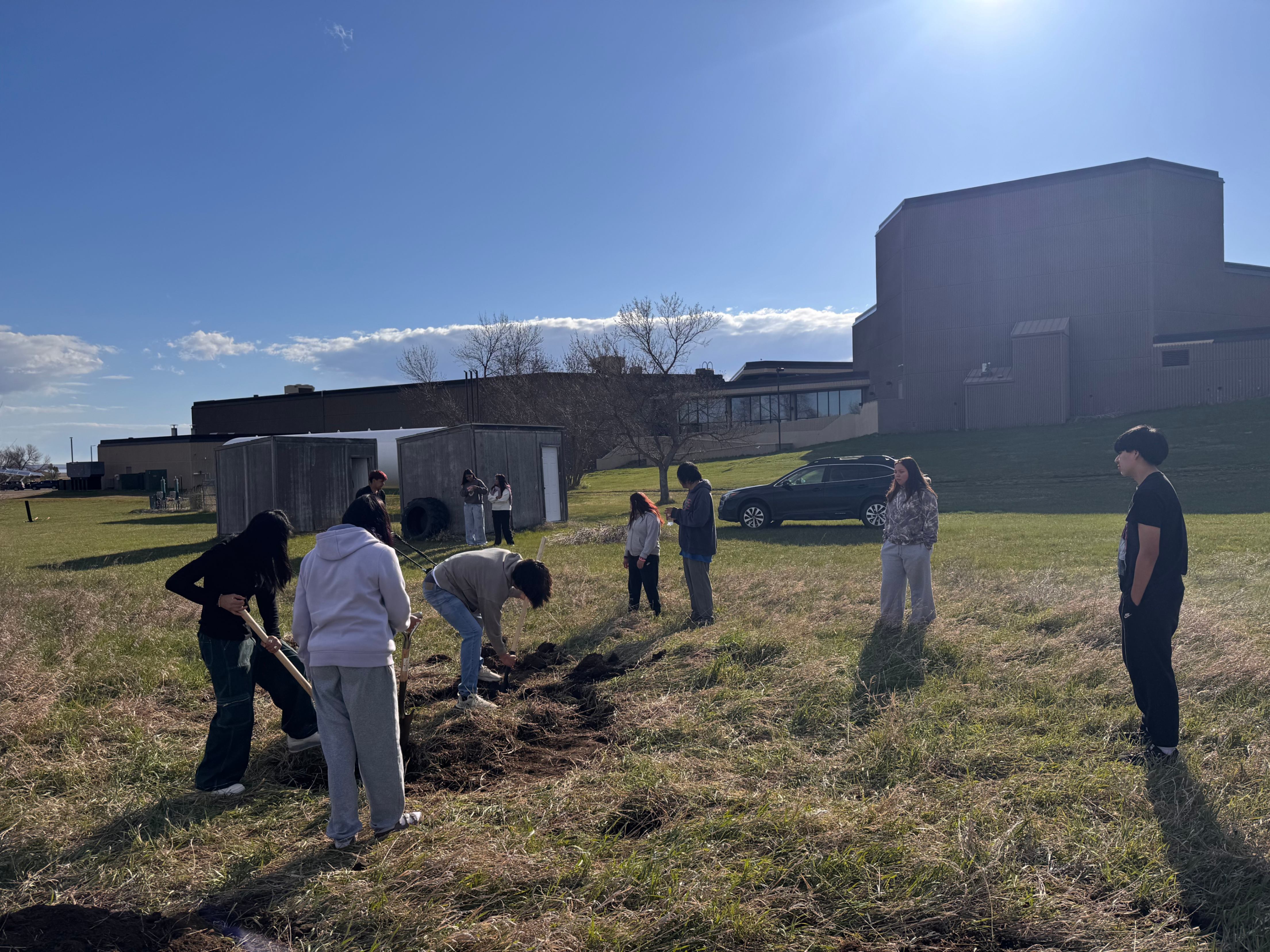 Students prepping ground for our inipi lodges