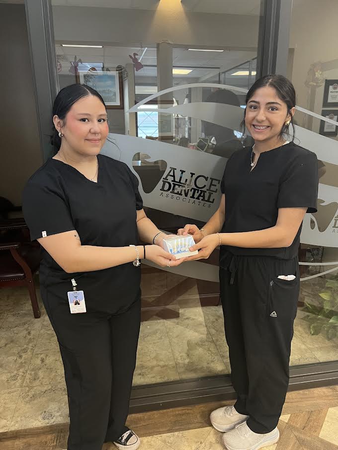 Health students working with partners