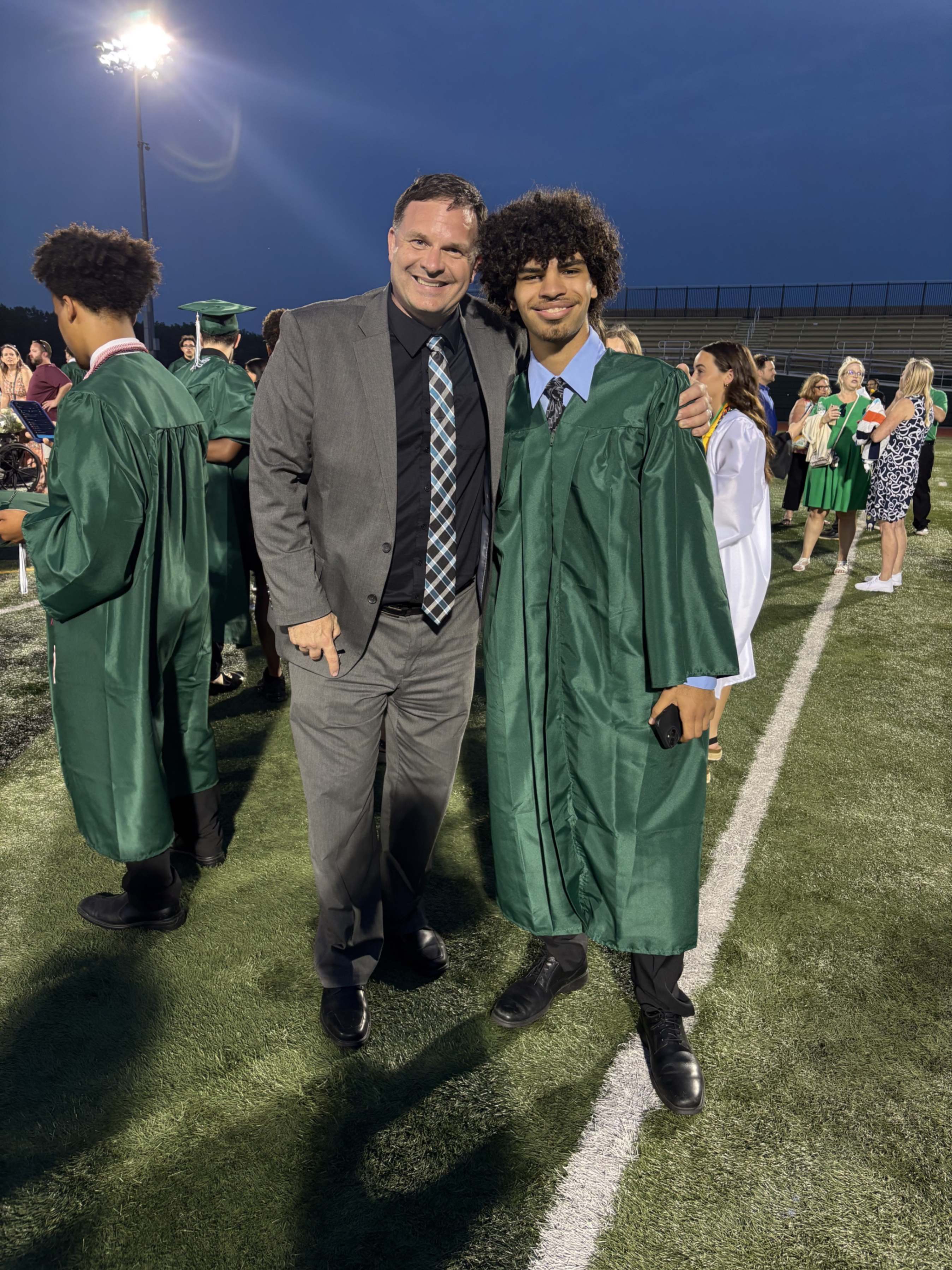 Graduation with Mr. Sparmblack and student
