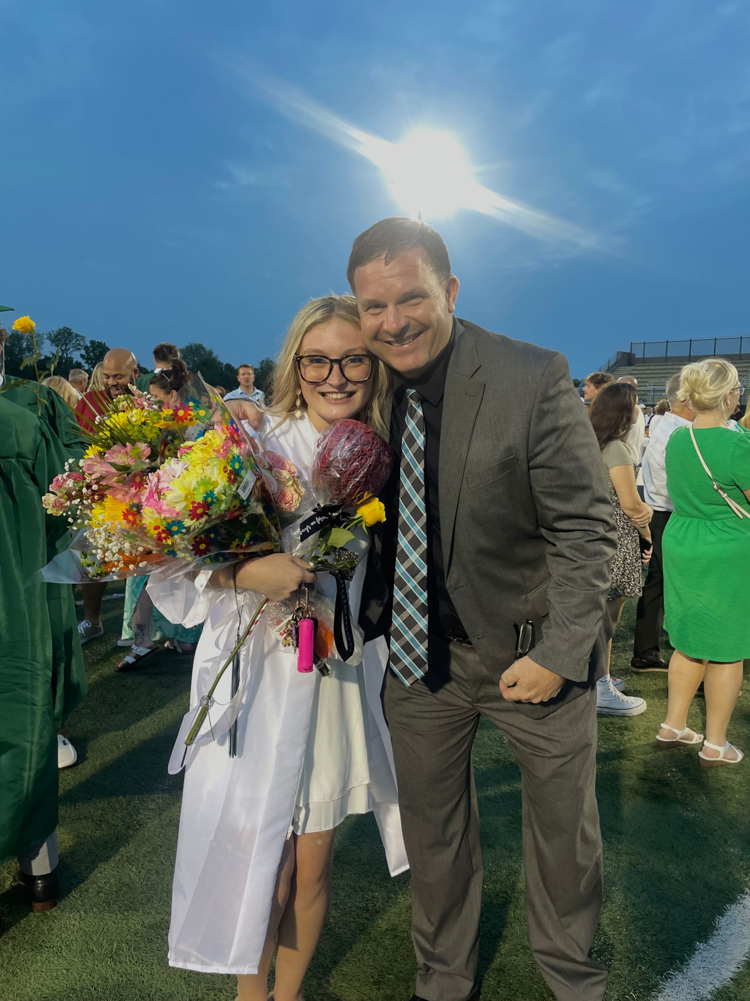 Mr. Sparmblack with student at graduation