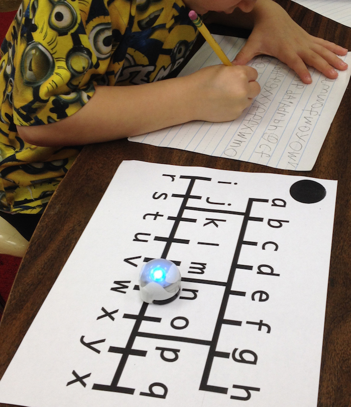 Forming letters in Kindergarten.