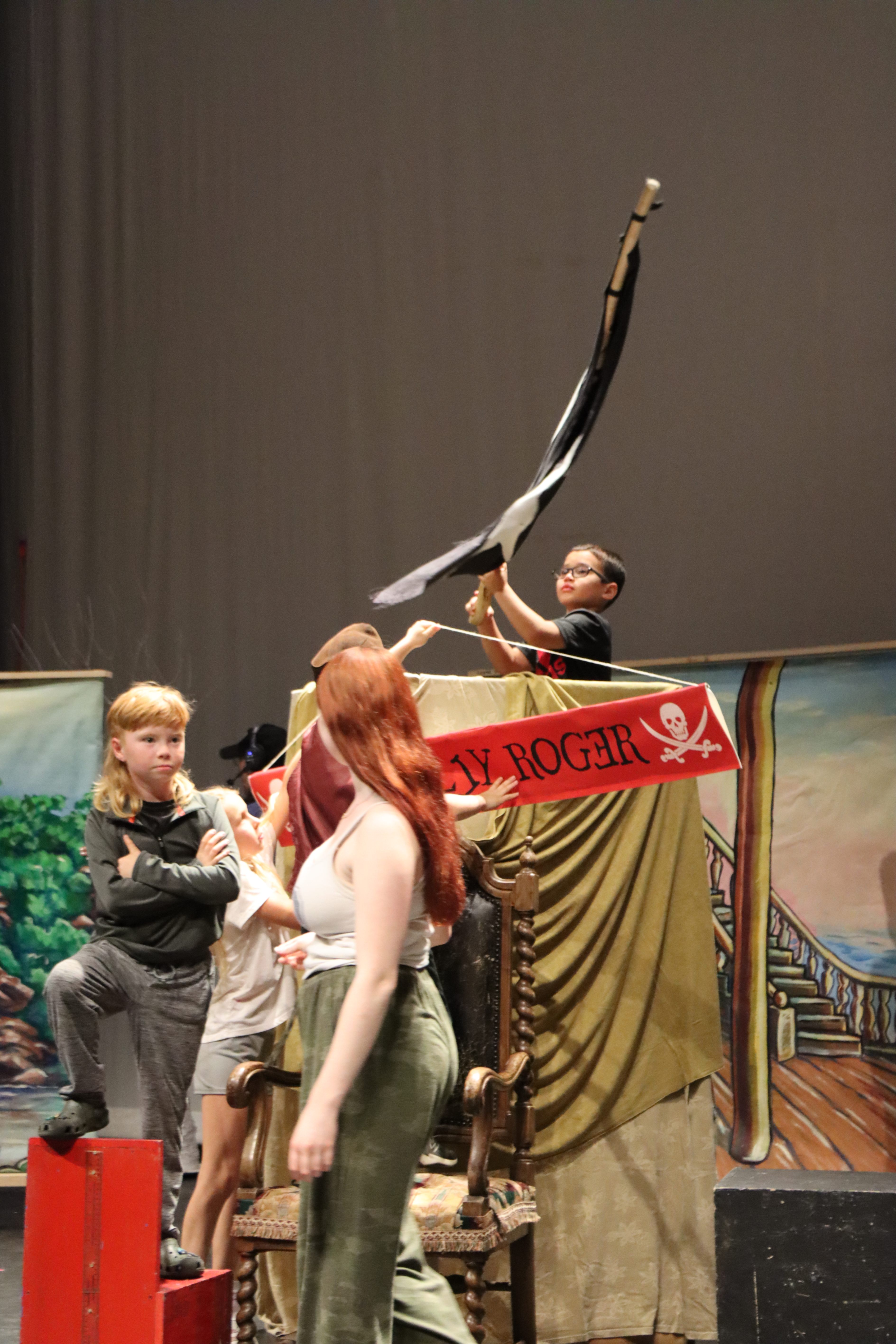 student actors on stage