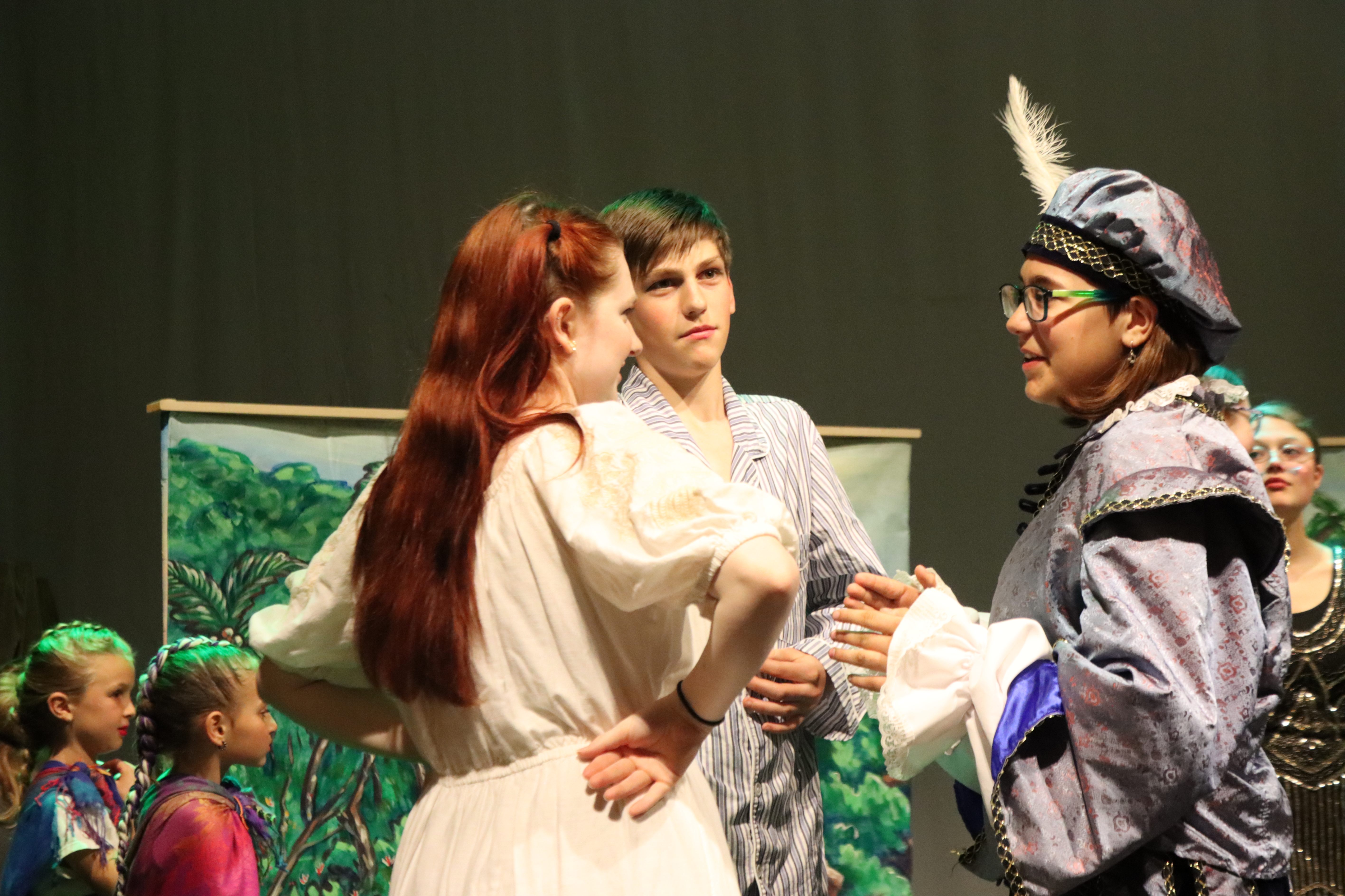 student actors on stage