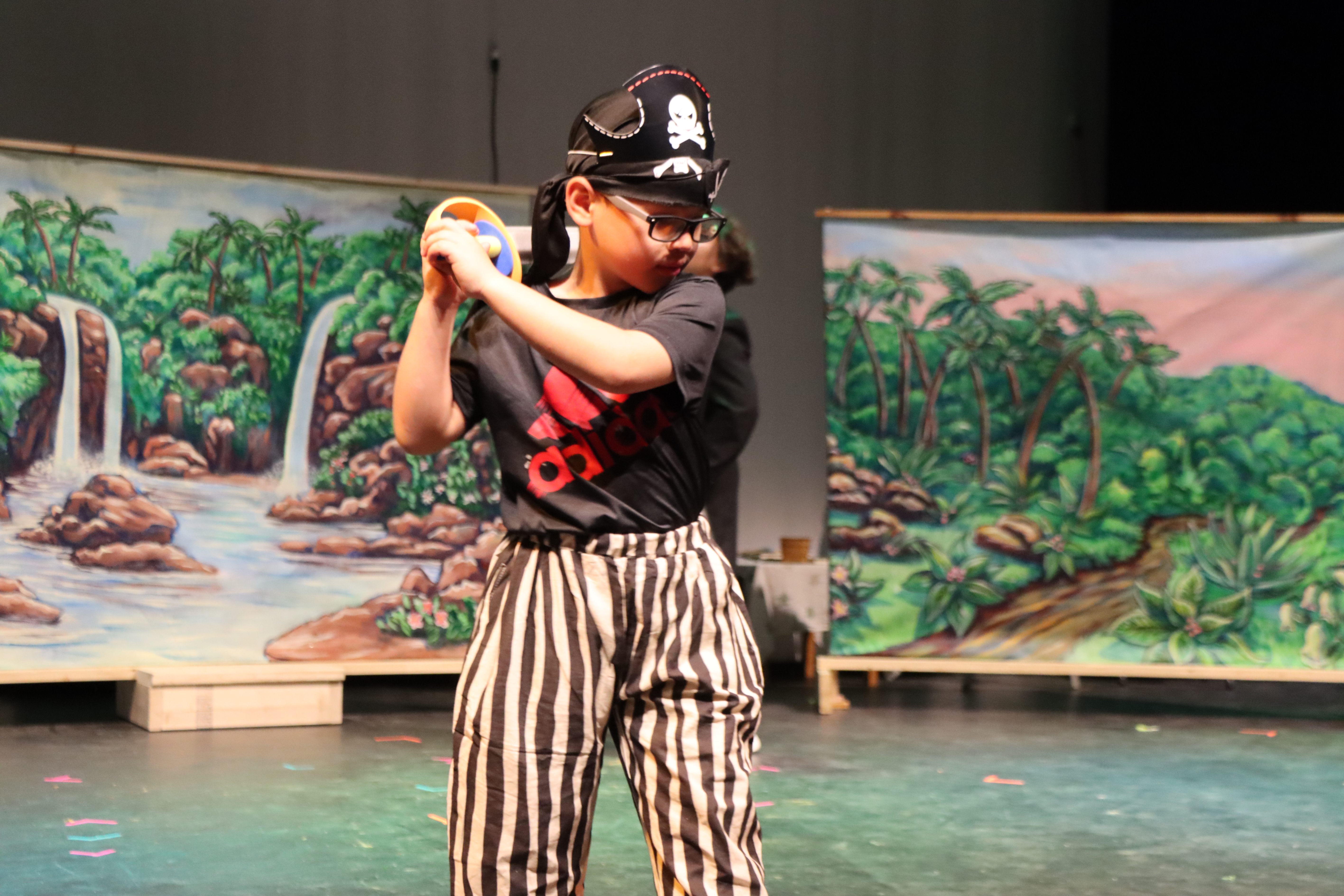 student actors on stage