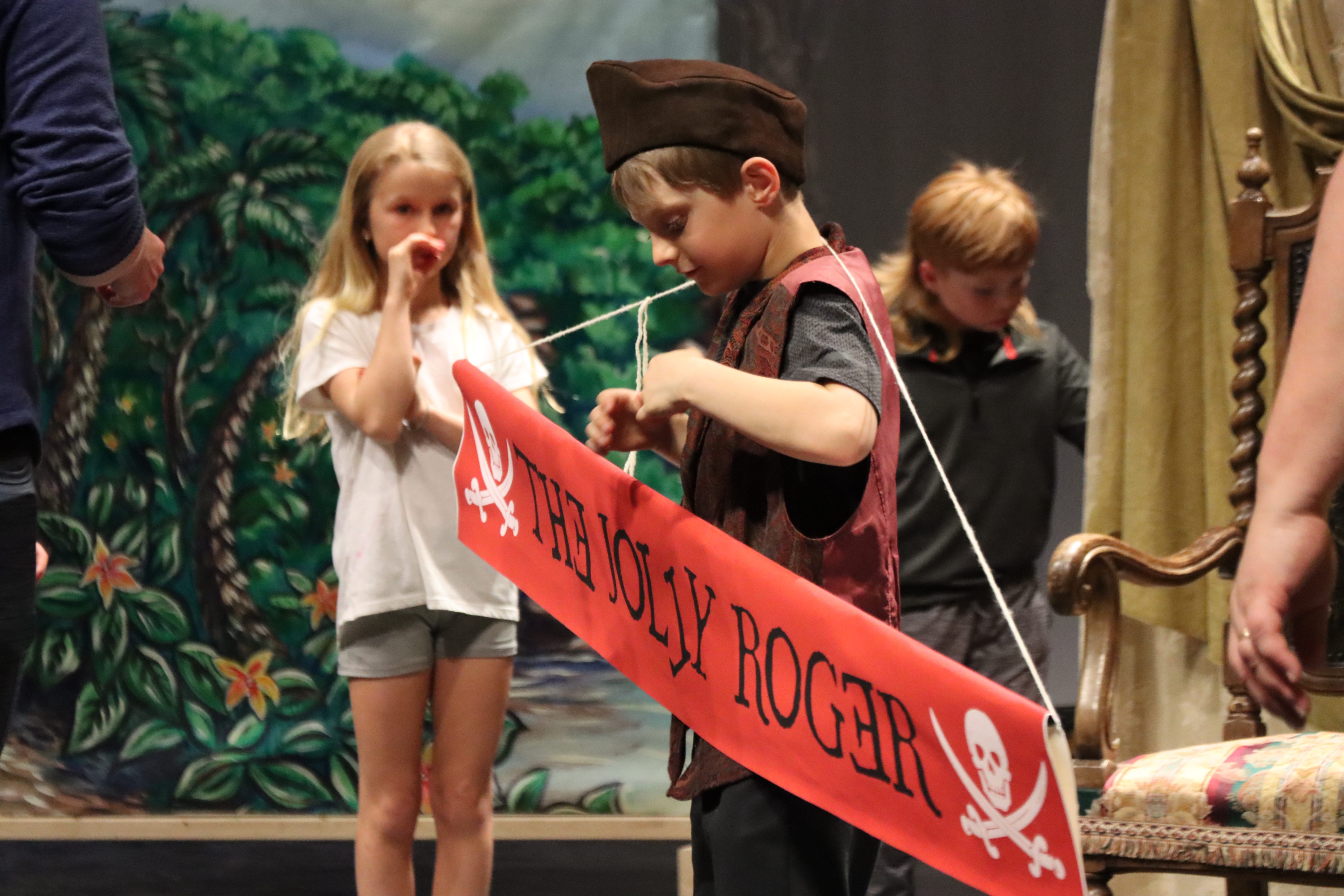 student actors on stage