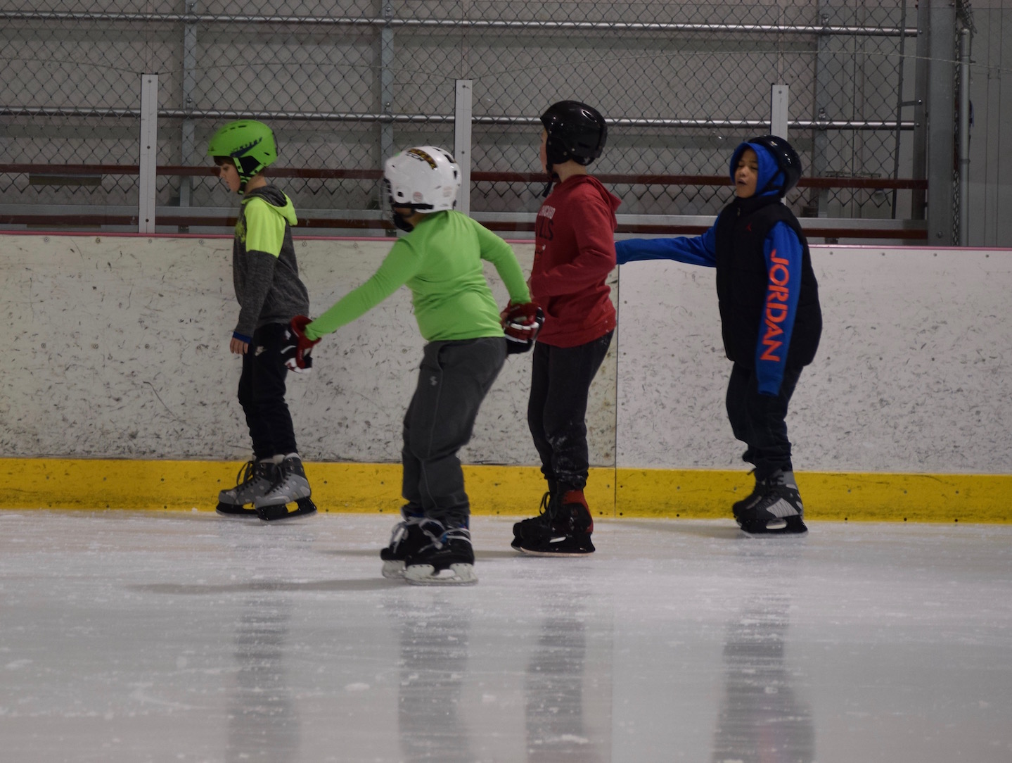 students learning to skate
