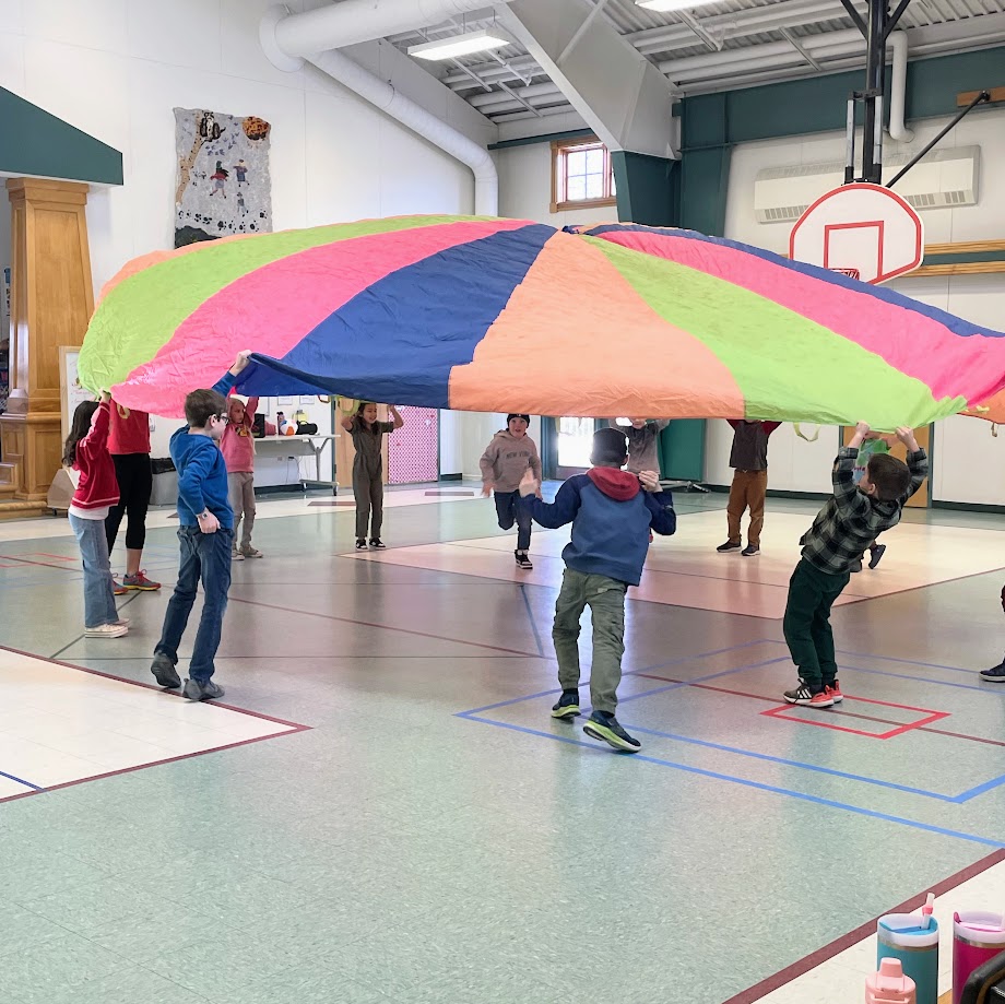 students with parachute