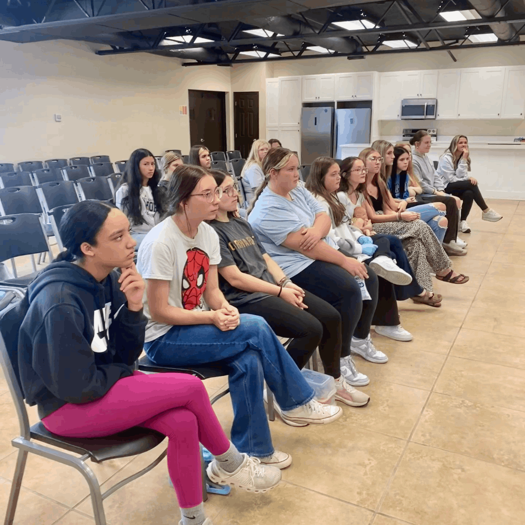 multiple students sitting watching career presentations