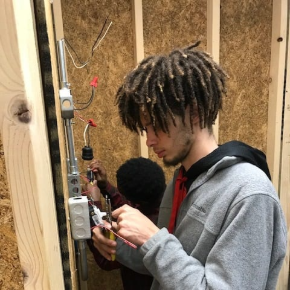 AHS electrical education student working on wiring