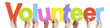 The word "Volunteer" with each letter held up by a different hand