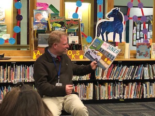 Mr. Cousineau reads