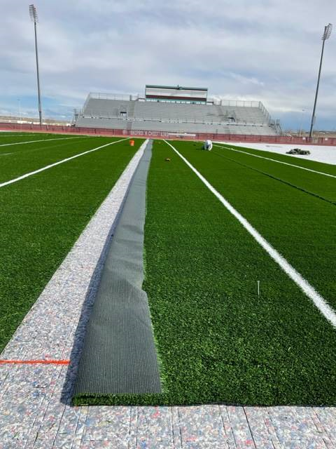 A.K. Sales installs turf at Ship Rock High