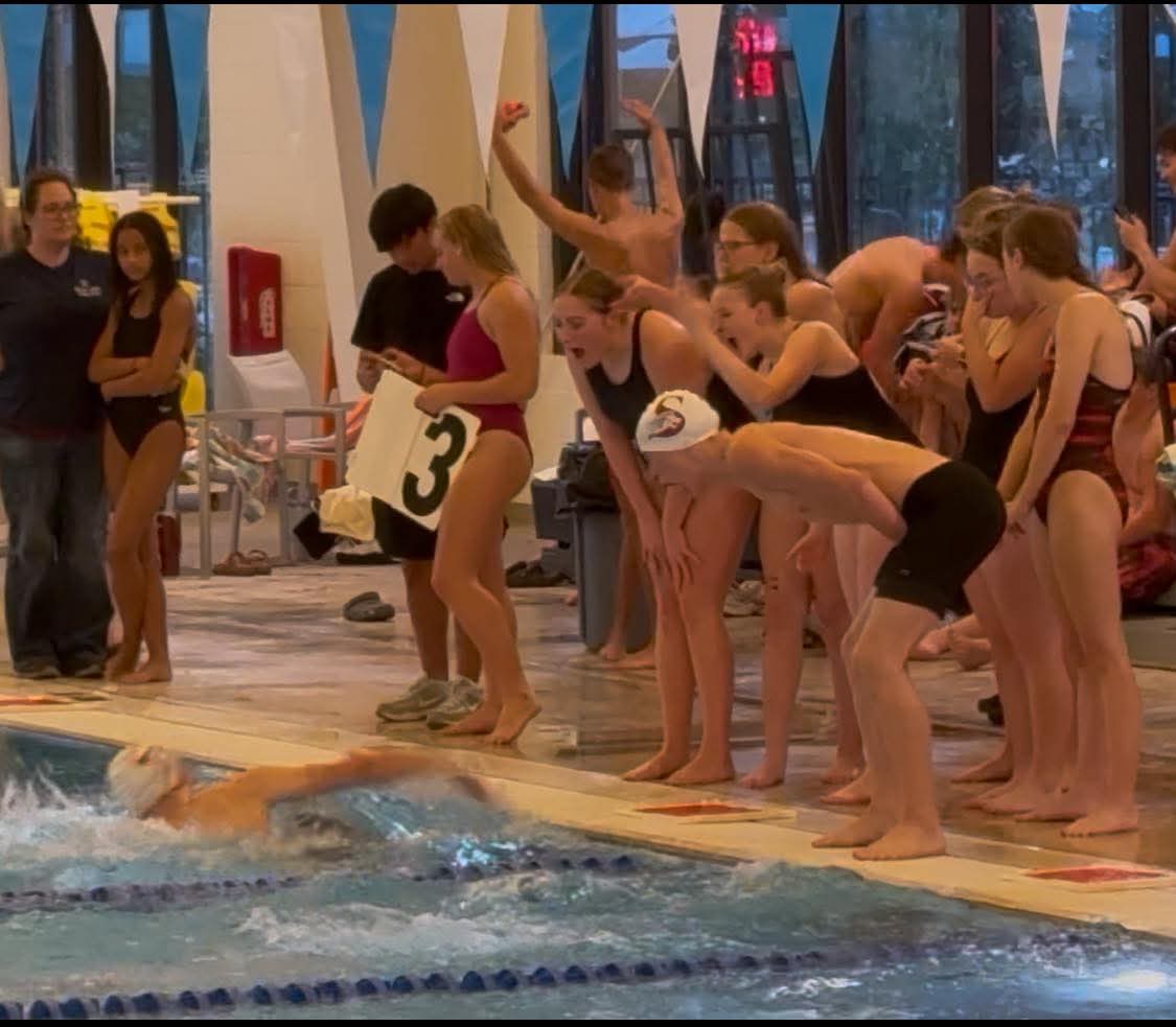 Girls WIN Swim Meet & Battles Qualifies for State
