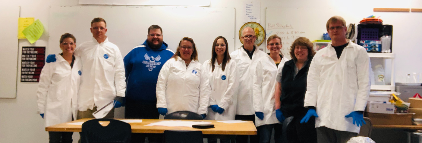 image of group of people wearing white lab coats