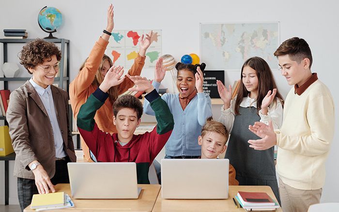 Students working at laptops