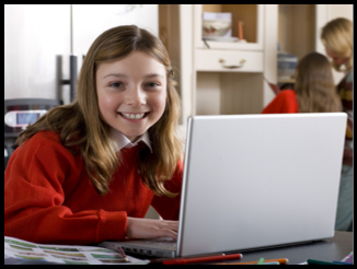 student with computer