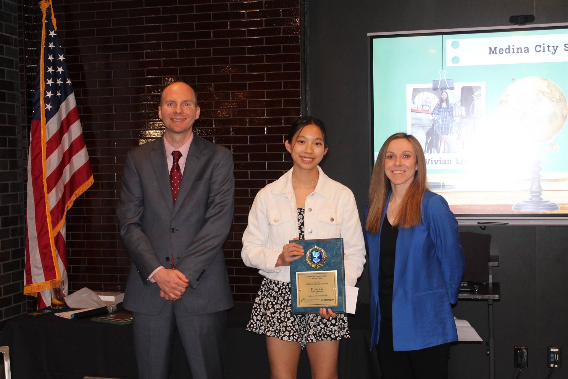 Superintendent Hlasko and Principal Tedona present Vivian Liu with her Top Scholars award
