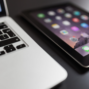 Laptop and a phone up close