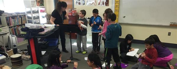 image of students practicing playing the recorder